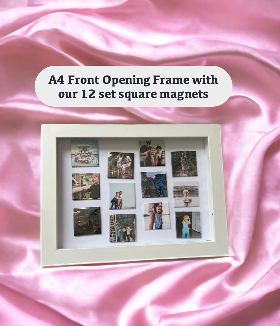 white magnetic frame with photo magnets on pink silk